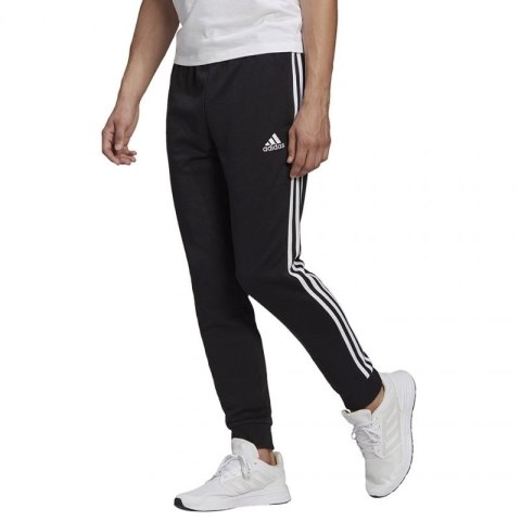 Spodnie adidas Essentials Tapered Cuff 3 Stripes M GK8831 Spodnie adidas Essentials Tapered Cuff 3 Stripes M GK8831