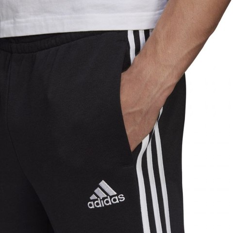 Spodnie adidas Essentials Tapered Cuff 3 Stripes M GK8831 Spodnie adidas Essentials Tapered Cuff 3 Stripes M GK8831