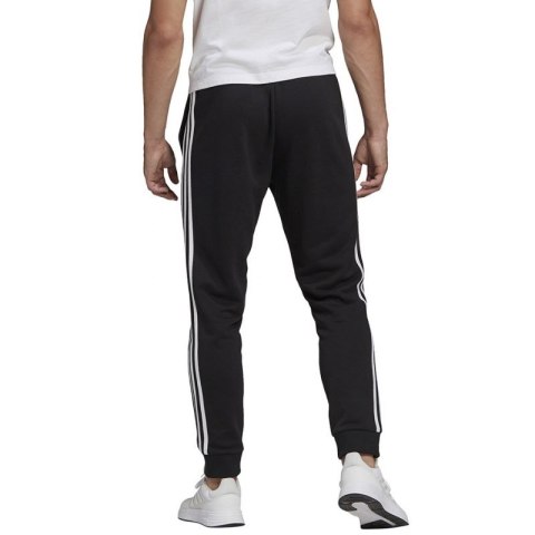 Spodnie adidas Essentials Tapered Cuff 3 Stripes M GK8831 Spodnie adidas Essentials Tapered Cuff 3 Stripes M GK8831