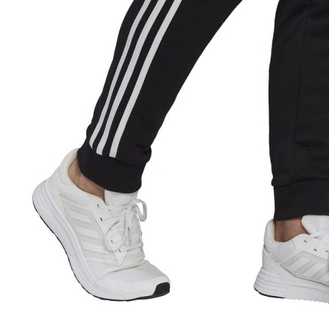 Spodnie adidas Essentials Tapered Cuff 3 Stripes M GK8831 Spodnie adidas Essentials Tapered Cuff 3 Stripes M GK8831