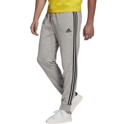 Spodnie adidas Essentials Tapered Cuff 3 Stripes M GK8889 Spodnie adidas Essentials Tapered Cuff 3 Stripes M GK8889