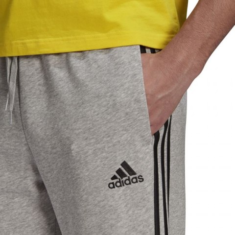 Spodnie adidas Essentials Tapered Cuff 3 Stripes M GK8889 Spodnie adidas Essentials Tapered Cuff 3 Stripes M GK8889
