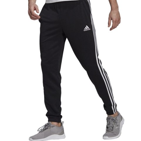 Spodnie adidas Essentials Tapered Elasticcuff 3 Stripes Pant M GK8829 Spodnie adidas Essentials Tapered Elasticcuff 3 Stripes Pant M GK8829
