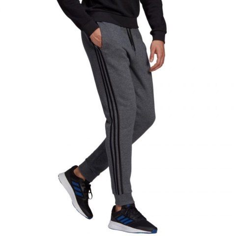 Spodnie adidas Essentials Tapered Cuff 3 Stripes M GK8826 Spodnie adidas Essentials Tapered Cuff 3 Stripes M GK8826