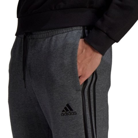 Spodnie adidas Essentials Tapered Cuff 3 Stripes M GK8826 Spodnie adidas Essentials Tapered Cuff 3 Stripes M GK8826