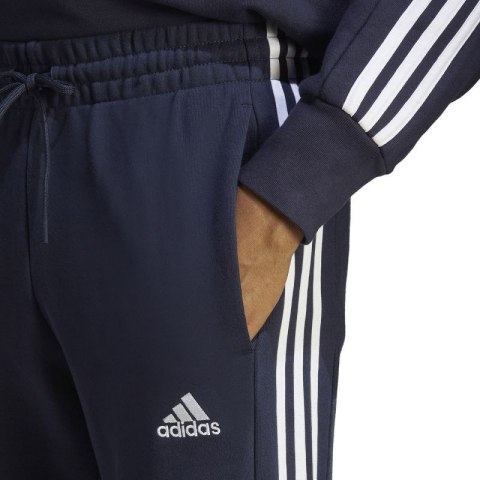 Spodnie adidas Essentials French Terry Tapered Cuff 3-Stripes M IC9406 Spodnie adidas Essentials French Terry Tapered Cuff 3-Stripes M IC9406